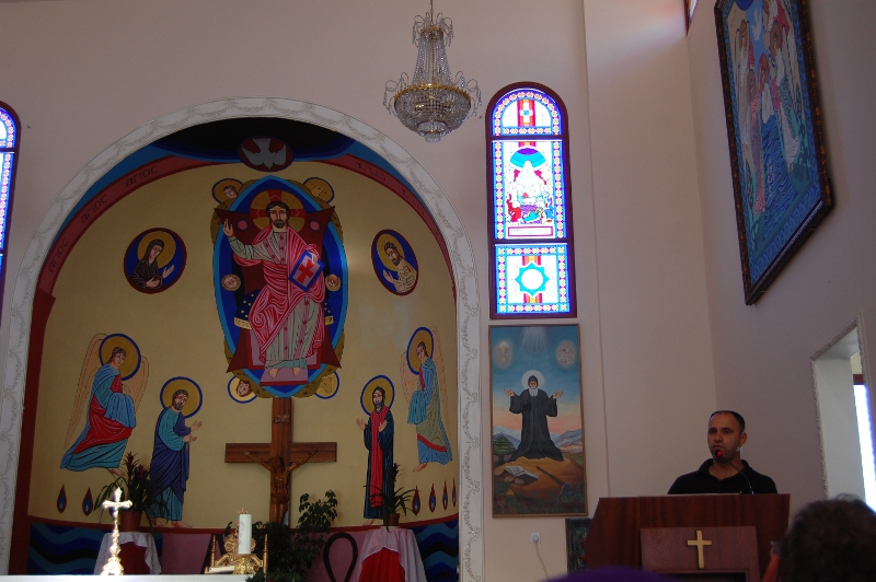 Shadi Khalloul speaking in the Maronite church of the Arameans in Northern Israel